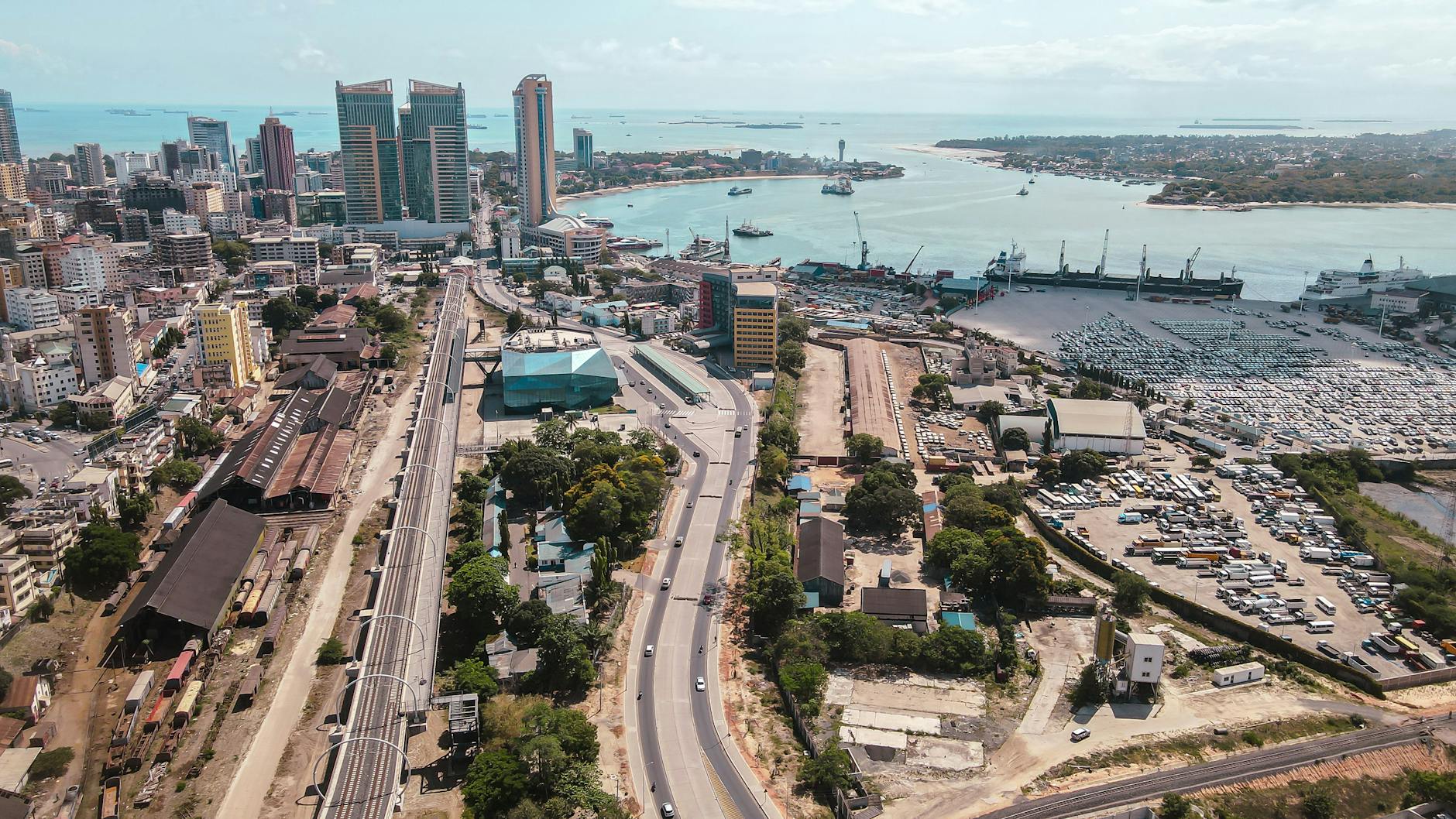 Aerial view of Dar es Salaam, showcasing the dynamic urban landscape and bustling port, a reflection of the diverse cultures and languages in Tanzania.