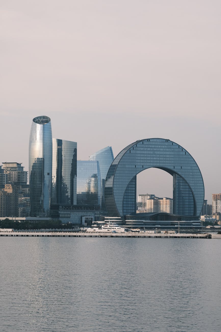 Modern skyline of Baku, Azerbaijan, featuring unique and contemporary architectural designs by the waterfront.